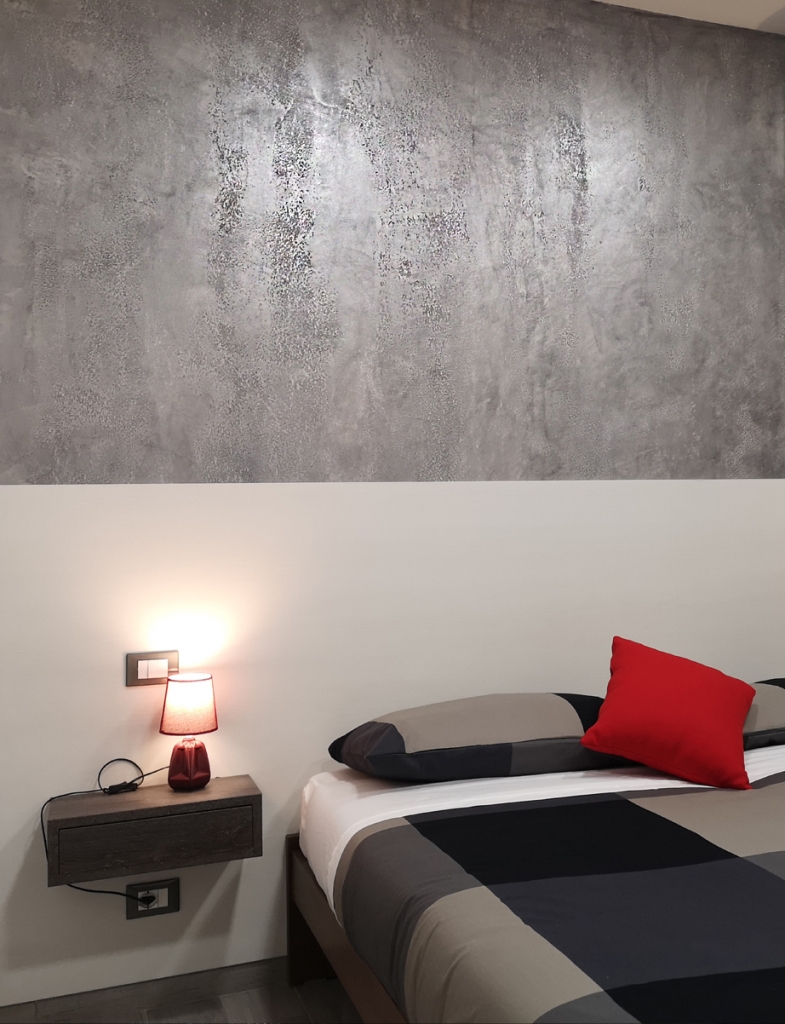 PLASMATORE SIMONE ARGIOLAS.Decorazione pareti Infinito